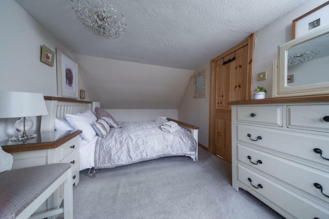 Holiday home Fasgadh Crofters